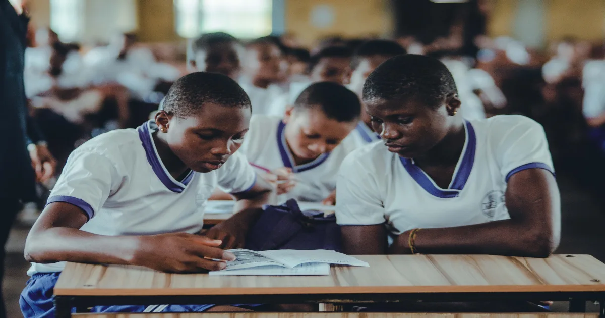 Grade 9 students studying in a Kenyan junior secondary school classroom