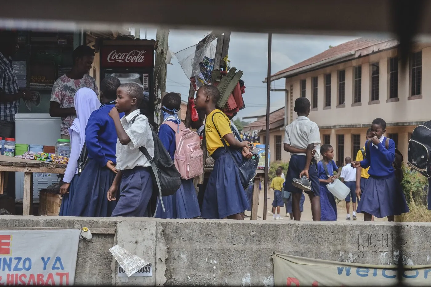 Students during school dismissal outside a Kenyan school gate
