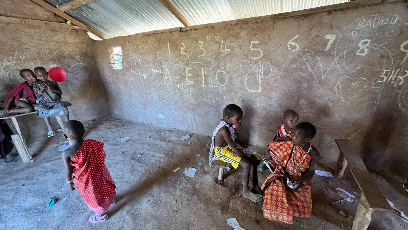African children in a classroom with numbers on the wall
